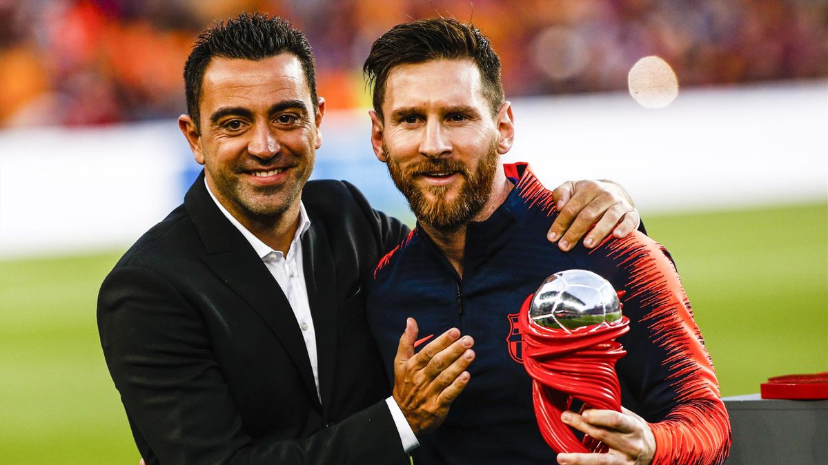 Xavi Hernandez et Lionel Messi, les deux joueurs les plus capés de l'histoire du FC Barcelone.