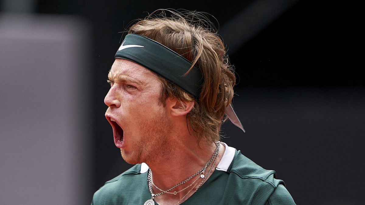 Andrey Rublev of Russia celebrates a point against Jack Draper of Great Britain during their Men's Singles match on Day Six of the Mutua Madrid Open at La Caja Magica on May 03, 2022 in Madrid, Spain