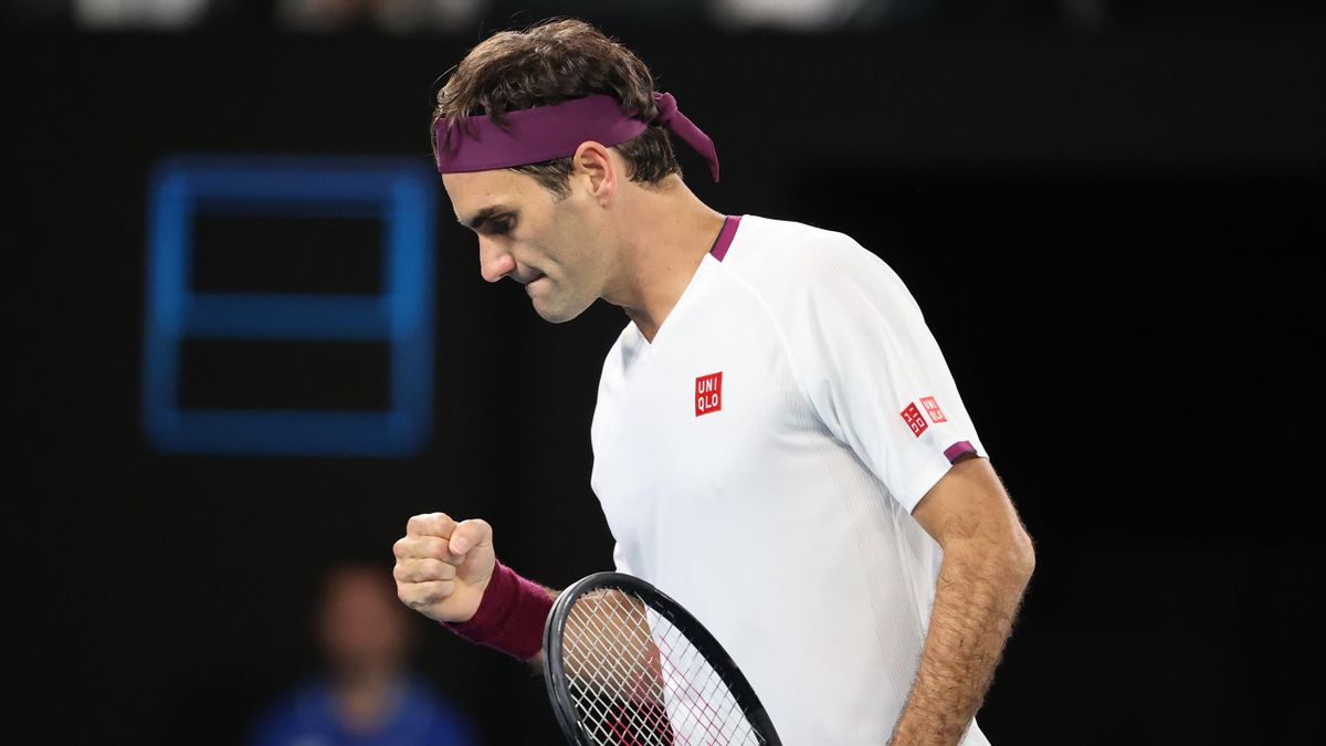 Switzerland's Roger Federer reacts after a point against Hungary's Marton Fucsovics during their men's singles match on day seven of the Australian Open tennis tournament in Melbourne
