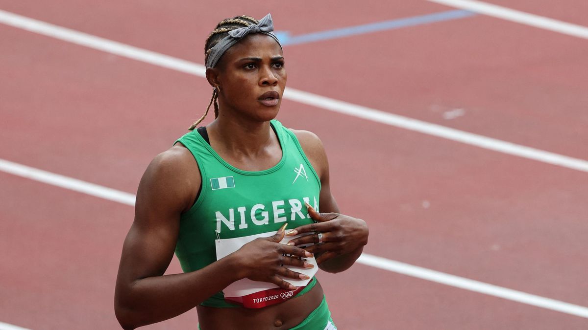 Nigeria's Blessing Okagbare reacts after winning her race in the women's 100m heats during the Tokyo 2020 Olympic Games at the Olympic Stadium in Tokyo on July 30, 2021.