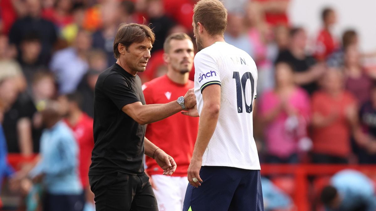 Antonio Conte the manager / head coach of Tottenham Hotspur with Harry Kane of Tottenham Hotspur at full time of the Premier League match between Nottingham Forest and Tottenham Hotspur