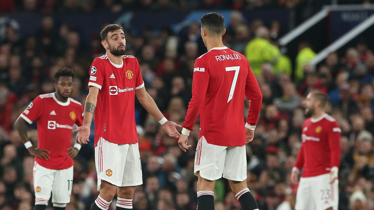 MANCHESTER, ENGLAND - OCTOBER 20: Bruno Fernandes and Cristiano Ronaldo of Manchester United react to conceding a goal to Mario Pasalic of Atalanta during the UEFA Champions League group F match between Manchester United and Atalanta at Old Trafford on Oc