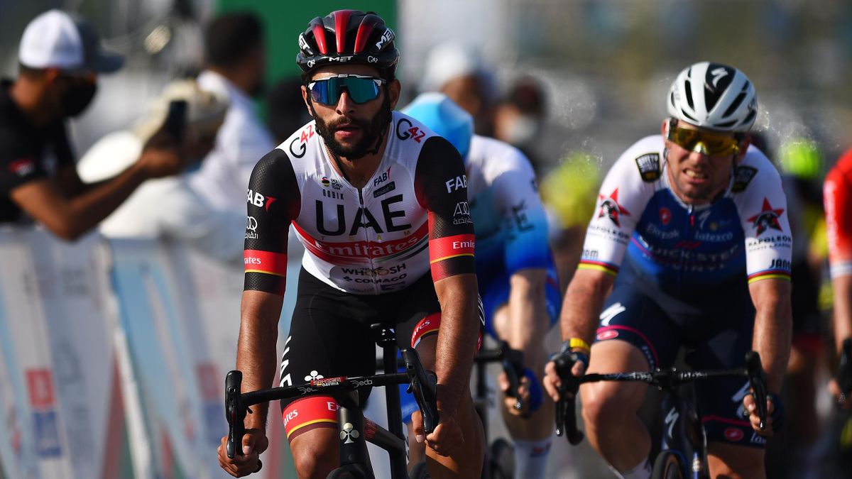 Fernando Gaviria Rendon of Colombia and UAE Team Emirates celebrates at finish line as stage winner ahead of Mark Cavendish of United Kingdom and Team Quick-Step - Alpha Vinyl during the 11th Tour Of Oman