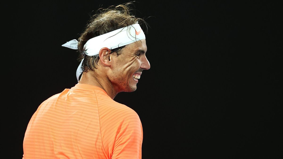 Rafael Nadal of Spain laughs at a spectator in his Men's Singles second round match against Michael Mmoh of the United States during day four of the 2021 Australian Open at Melbourne Park