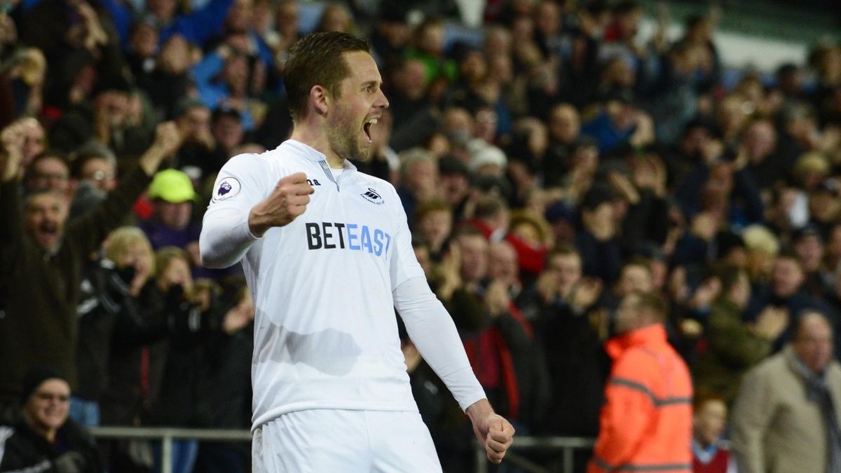 Swansea City's Gylfi Sigurdsson celebrates scoring their second goal