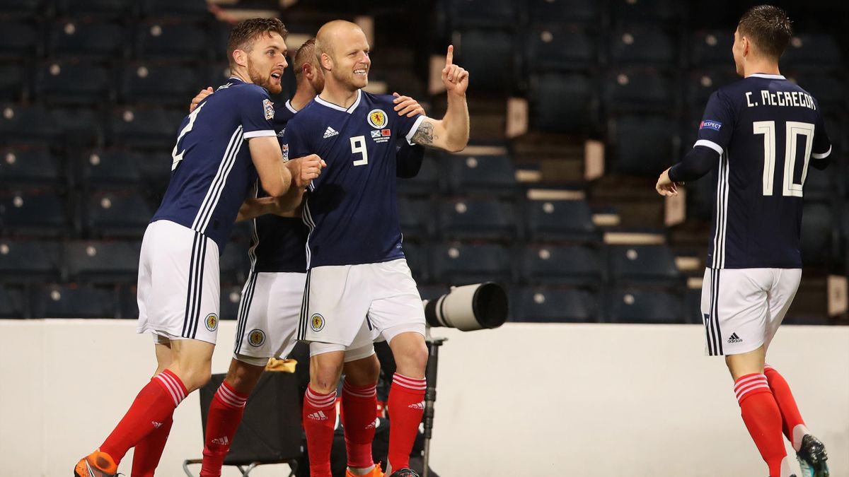 Steven Naismith of Scotland (9) celebrates with team mates as Berat Gjimshiti of Albania scores an own goal fortheir first goal during the UEFA Nations League C Group One match between Scotland and Albania.