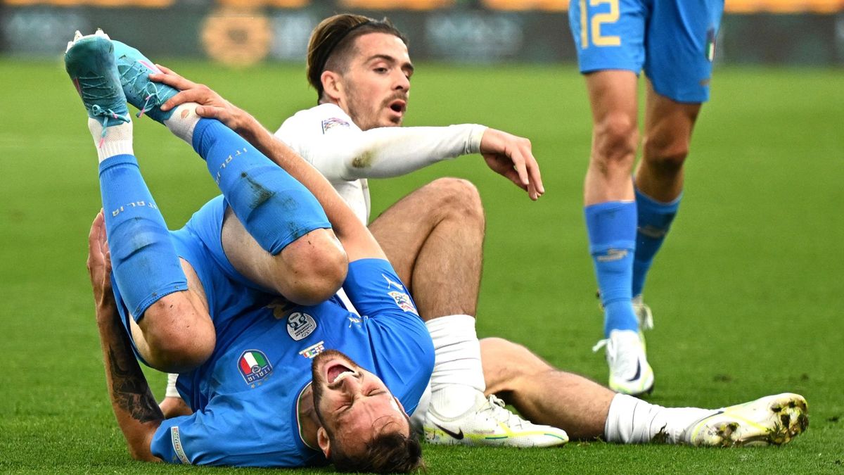 Federico Gatti is challenged by Jack Grealish during the UEFA Nations League match between England and Italy at Molineux on June 11, 2022 in Wolverhampton, England