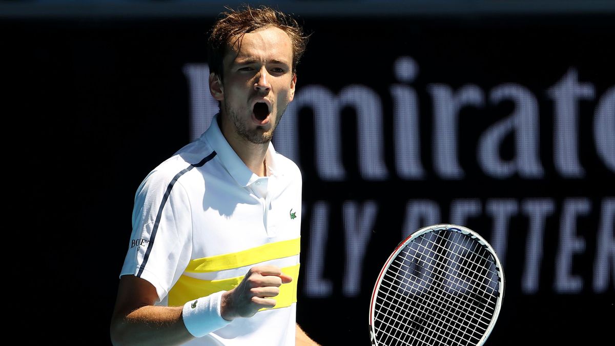Russia's Daniil Medvedev reacts on a point against Mackenzie McDonald of the US during their men's singles match on day eight of the Australian Open tennis tournament in Melbourne