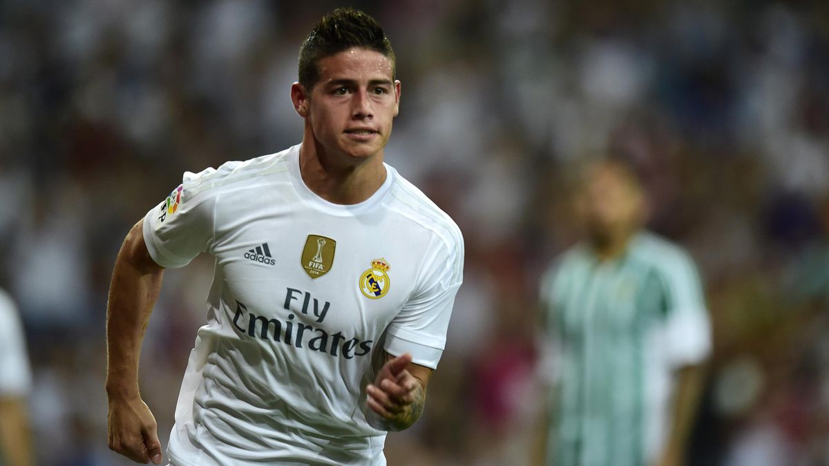 Real Madrid's Colombian midfielder James Rodriguez celebrates after scoring during the Spanish league football match Real Madrid CF vs Real Betis Balompie at the Santiago Bernabeu stadium in Madrid on August 29, 2015.