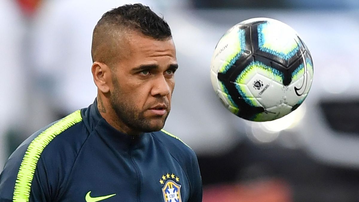 Brazil's player Daniel Alves eyes the ball during a practice session in Sao Paulo, Brazil, on June 21, 2019, on the eve of the Copa America Group A football match against Peru.