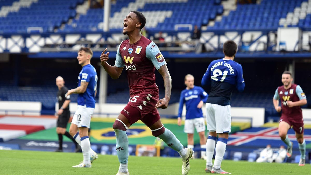 Ezri Konsa of Aston Villa celebrates after scoring his sides first goal during the Premier League match between Everton FC and Aston Villa at Goodison Park on July 16, 2020 in Liverpool, England. Football Stadiums around Europe remain empty due to the Co