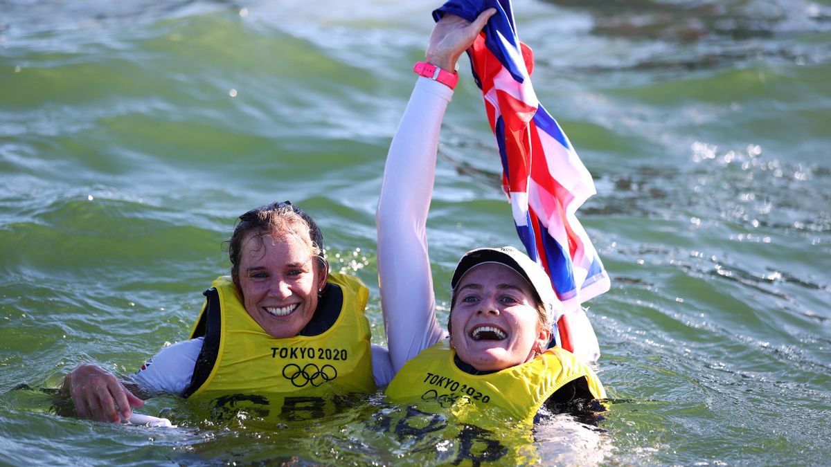 Hannah Mills (left) and Eilidh McIntyre (right) celebrated by jumping in the water