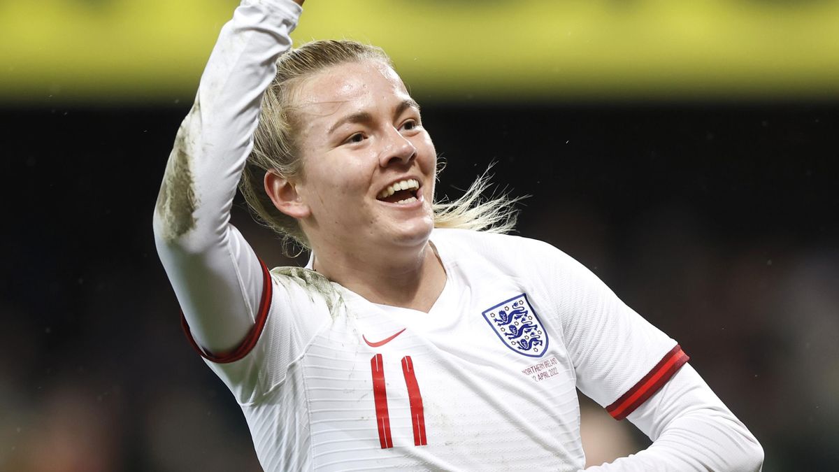 Lauren Hemp celebrates scoring for England