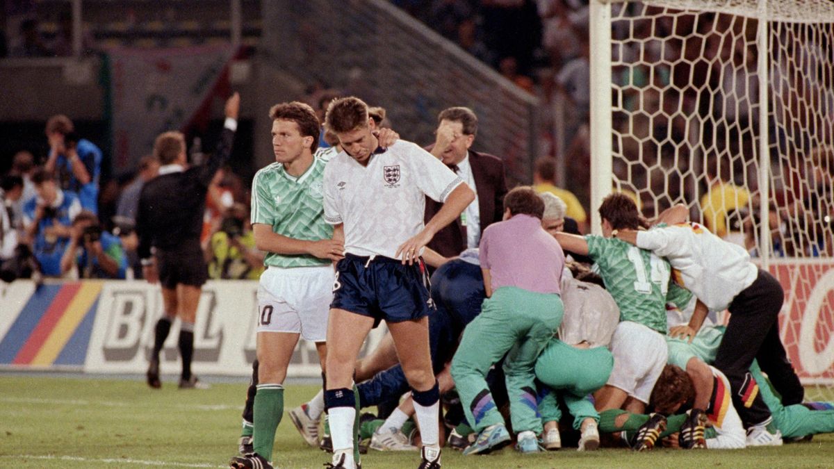 Chris Waddle is consoled by Lothar Matthaus
