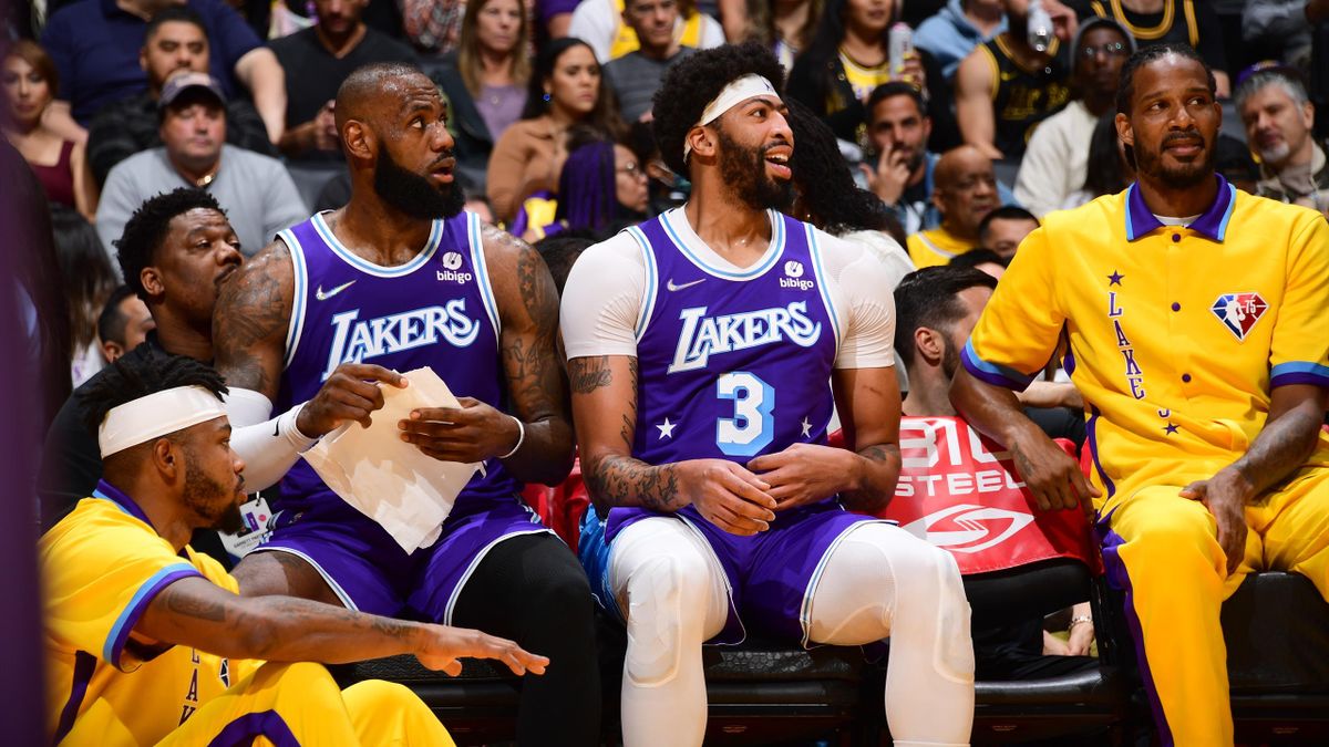 LOS ANGELES, CA - APRIL 1: LeBron James #6, Anthony Davis #3, and Trevor Ariza #1 of the Los Angeles Lakers look on from the bench during the game against the New Orleans Pelicans on April 1, 2022 at Crypto.Com Arena in Los Angeles, California. NOTE TO US