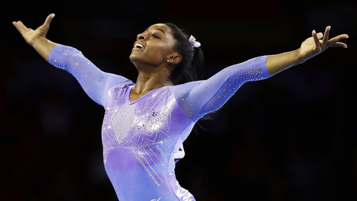 Simone Biles of the United States performs in the women's floor exercise en route to winning the title at the artistic gymnastics world championships in Stuttgart, Germany, on Oct. 13, 2019