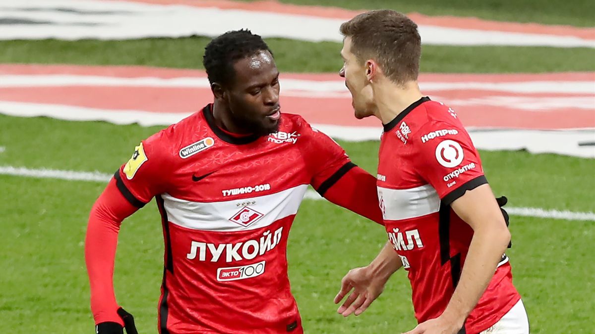 Spartak Moscows Victor Moses (L) and Roman Zobnin celebrate a goal in a 2020/2021 Russian Premier League Round 15 football match between Spartak Moscow and Dynamo Moscow at Otkritie Arena