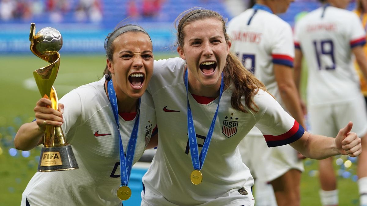 Mallory Pugh and Tierna Davidson celebratint with the trophy after their victory during the 2019 FIFA Women's World Cup France Final match between The United States of America and The Netherlands at Stade de Lyon on July 7, 2019 in Lyon, France.
