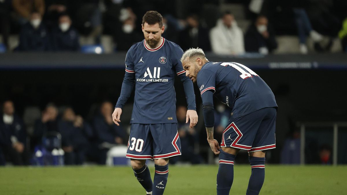 Lionel Messi (L) and Neymar JR. (R) of Paris Saint-Germain are seen during the UEFA Champions League round of sixteen leg two match between Real Madrid and Paris Saint-Germain at Estadio Santiago Bernabeu on March 09, 2022 in Madrid, Spain