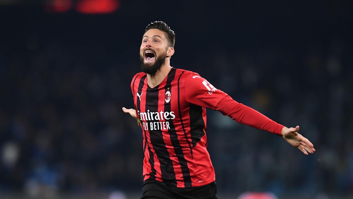 Olivier Giroud of AC Milan celebrates after scoring the opening goal during the Serie A match between SSC Napoli and AC Milan at Stadio Diego Armando Maradona on March 06, 2022 in Naples