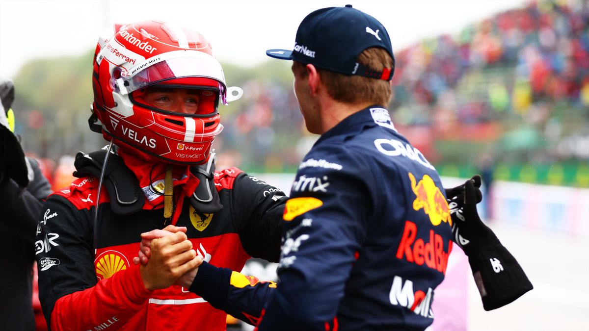 Pole position qualifier Max Verstappen of the Netherlands and Oracle Red Bull Racing and Second placed qualifier Charles Leclerc of Monaco and Ferrari shake hands in parc ferme during qualifying ahead of the F1 Grand Prix of Emilia Romagna at Autodromo En
