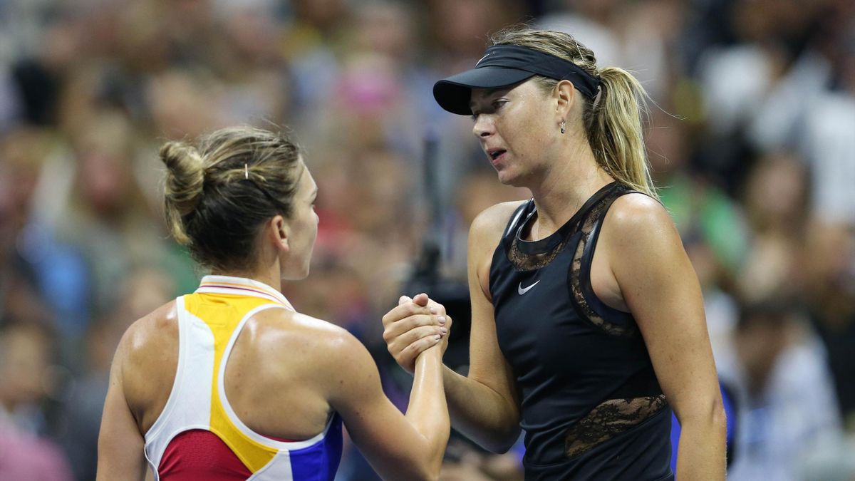 ; Maria Sharapova of Russia (right) shakes hands with Simona Halep (left) after their match on day one of the U.S. Open tennis tournament at USTA Billie Jean King National Tennis Center