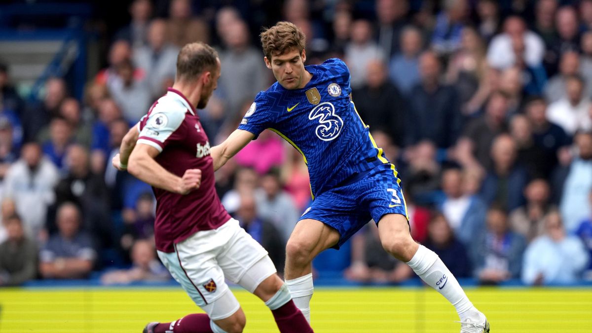 Marcos Alonso of Chelsea FC and Vladimir Coufal of West Ham United in action during the Premier League match between Chelsea and West Ham United at Stamford Bridge on April 24, 2022 in London, England. (Photo by