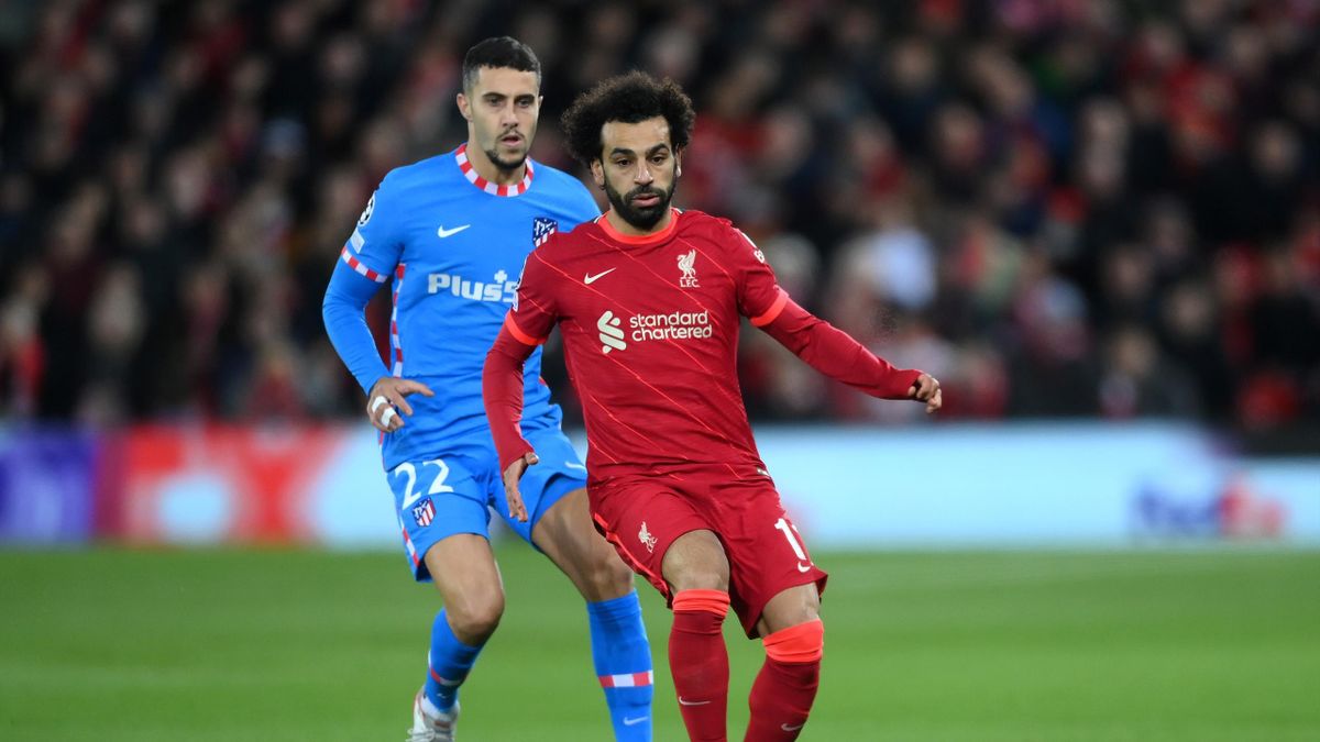 LIVERPOOL, ENGLAND - NOVEMBER 03: Mario Hermoso of Atletico Madrid challenges Mohamed Salah of Liverpool during the UEFA Champions League group B match between Liverpool FC and Atletico Madrid at Anfield on November 03, 2021 in Liverpool, England. (Photo