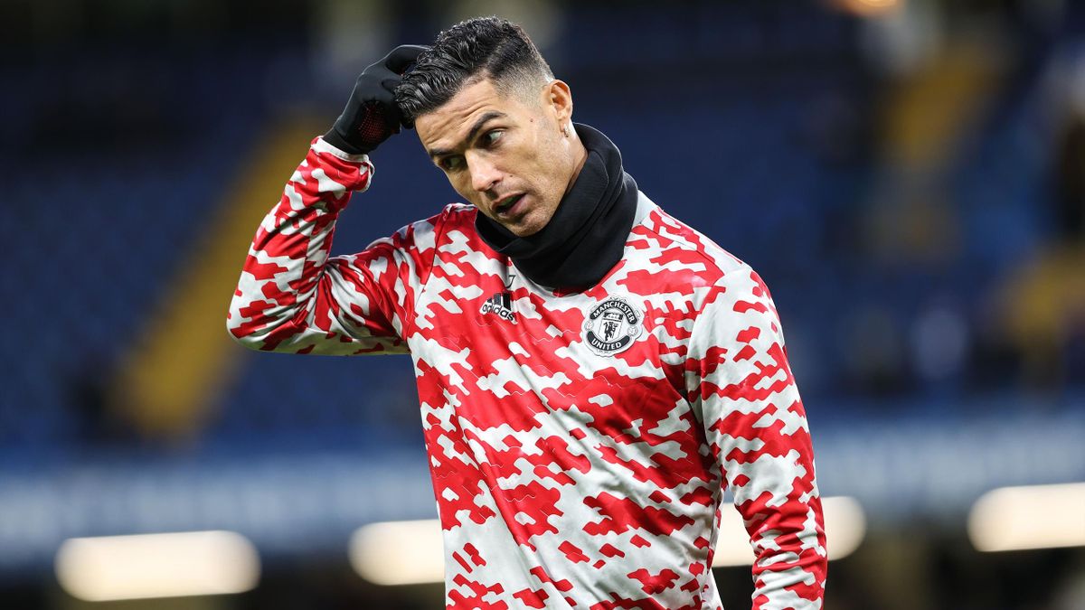 Cristiano Ronaldo of Man Utd scotches his head ahead of the Premier League match between Chelsea and Manchester United