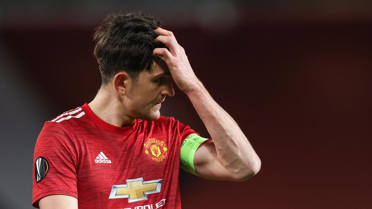 Harry Maguire of Manchester United reacts during the UEFA Europa League Round of 16 First Leg match between Manchester United and A.C. Milan at Old Trafford
