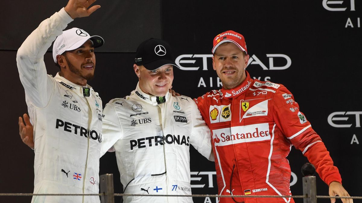 Mercedes' British driver Lewis Hamilton, Mercedes' Finnish driver Valtteri Bottas and Ferrari's German driver Sebastian Vettel