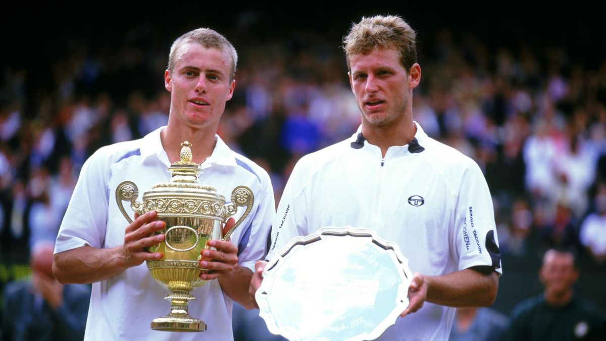 WIMBLEDON - 7 JULY: Lleyton Hewitt of Australia with the trophy after victory over David Nalbandian of Argentina in the Men's Singles Final of the Lawn Tennis Championships at the All England Club in Wimbledon, England on July 7, 2002. Hewitt won 6-1. 6-3