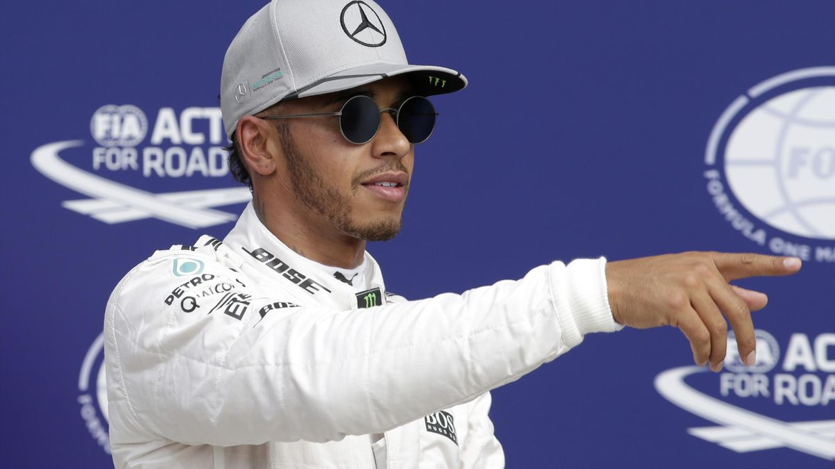 Lewis Hamilton celebrates pole position at the Italian GP