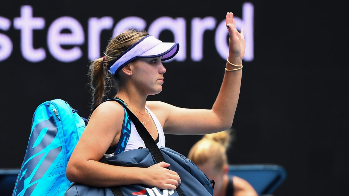Sofia Kenin of the US leaves after losing against Estonia's Kaia Kanepi during their women's singles match on day four of the Australian Open tennis tournament in Melbourne
