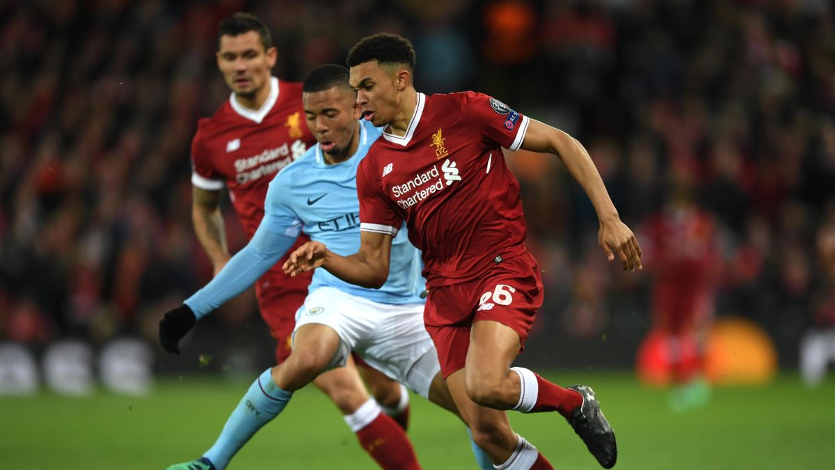 Trent Alexander-Arnold of Liverpool is challenged by Gabriel Jesus of Manchester City during the UEFA Champions League Quarter Final Leg One match between Liverpool and Manchester City at Anfield on April 4, 2018 in Liverpool, England.