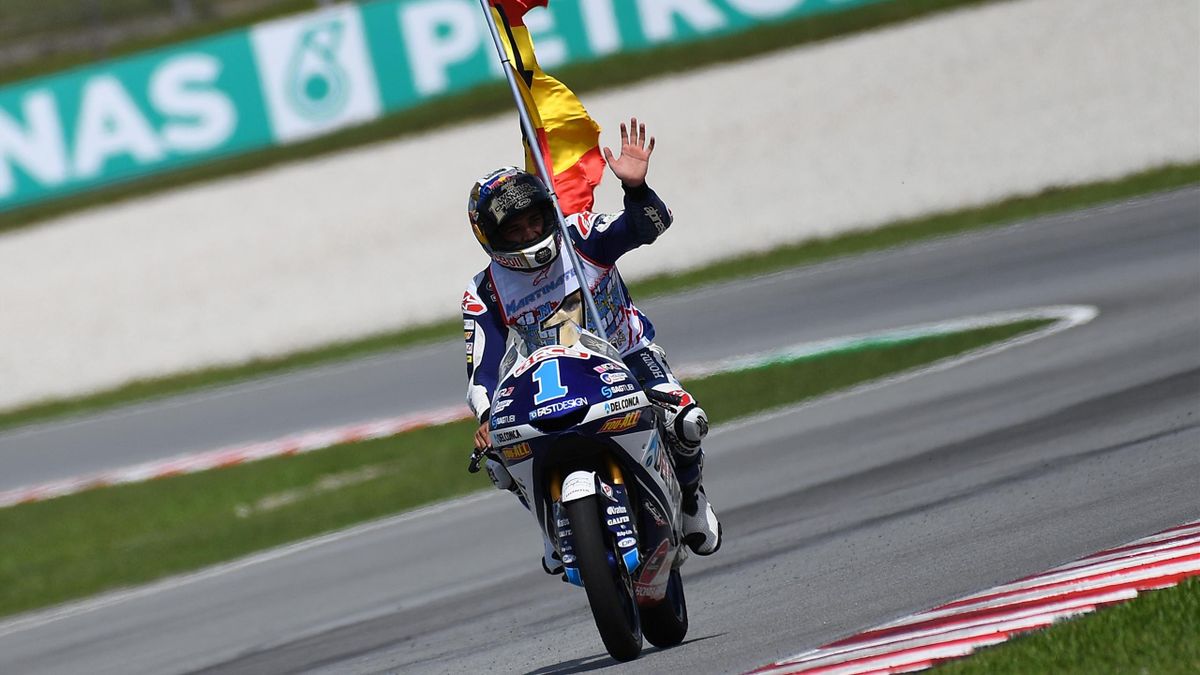 Spanish rider Jorge Martin celebrates after winning the Moto3 race of the Malaysia MotoGP at the Sepang International Circuit in Sepang on November 4, 2018