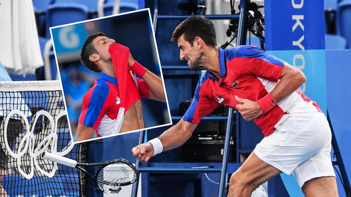 Serbia's Novak Djokovic reacts during his Tokyo 2020 Olympic Games men's singles tennis match for the bronze medal against Spain's Pablo Carreno Busta at the Ariake Tennis Park in Tokyo