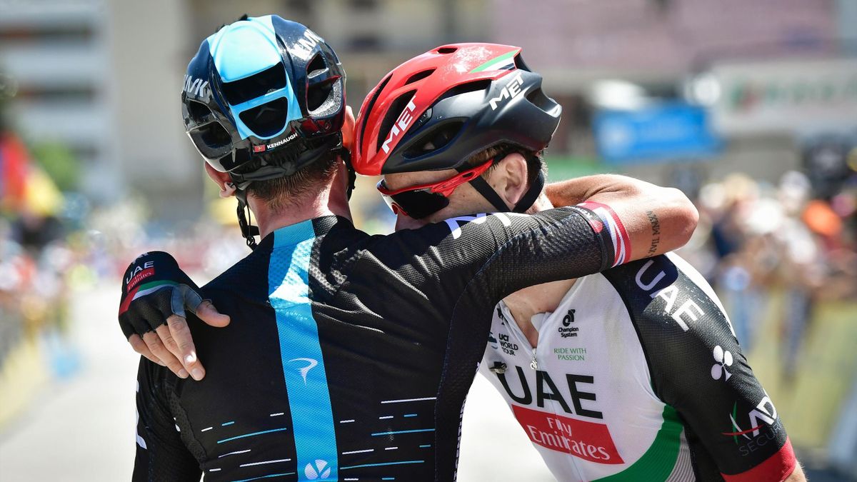 Stage winner Great Britain's Peter Kennaugh (L) is congratulated by second-placed Great Britain's Ben Swift