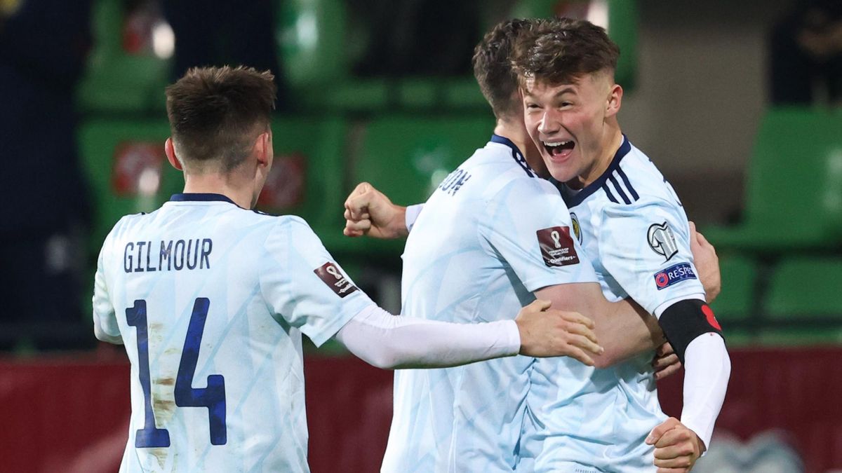 Scotland's Nathan Patterson (R) celebrates scoring to make it 1-0 during a FIFA World Cup Qualifier between Moldova and Scotland at the Zimbru Stadium, on November 12, 2021, in Chisinau, Moldova