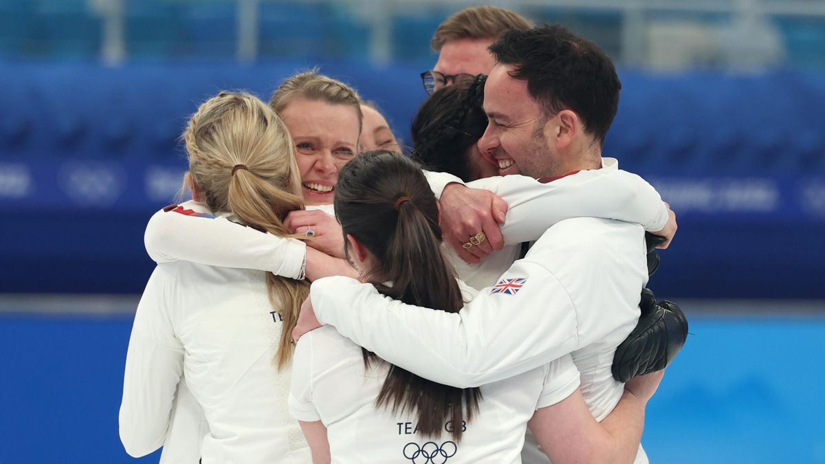 Team Great Britain celebrate after defeating Team Japan in the Women's Gold Medal match between Team Japan and Team Great Britain at National Aquatics Centre on February 20, 2022 in Beijing, China.