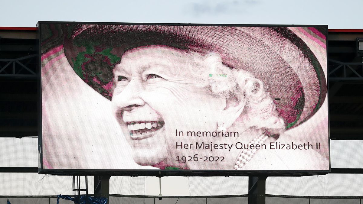 The LED board shows a photo Queen Elizabeth II as players of FC Zurich and Arsenal observe a minutes silence after it was announced that Queen Elizabeth II has passed away