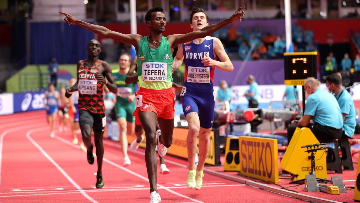 Samuel Tefera of Ethiopia wins the Men's 1500 Metres final ahead of Jakob Ingebrigtsen of Norway at the World Athletics Indoor Championships Belgrade 2022 at Belgrade Arena on March 20, 2022