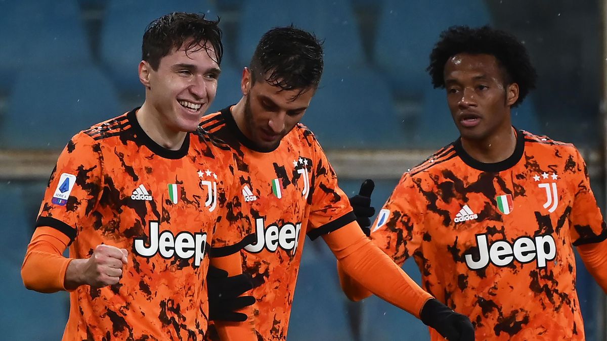 Juventus' midfielder Federico Chiesa of Italy (1st-L) celebrates after scoring with his teammates during the Italian Serie A football match Sampdoria vs Juventus played behind closed doors on January 30, 2021 at the Luigi Ferraris Stadium in Genoa
