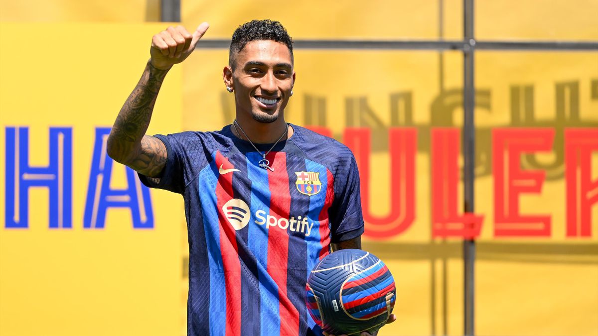 Raphael Dias Belloli 'Raphinha' poses for the media as he is presented as a FC Barcelona player at Ciutat Esportiva Joan Gamper on July 15, 2022 in Sant Joan Despi, Spain.