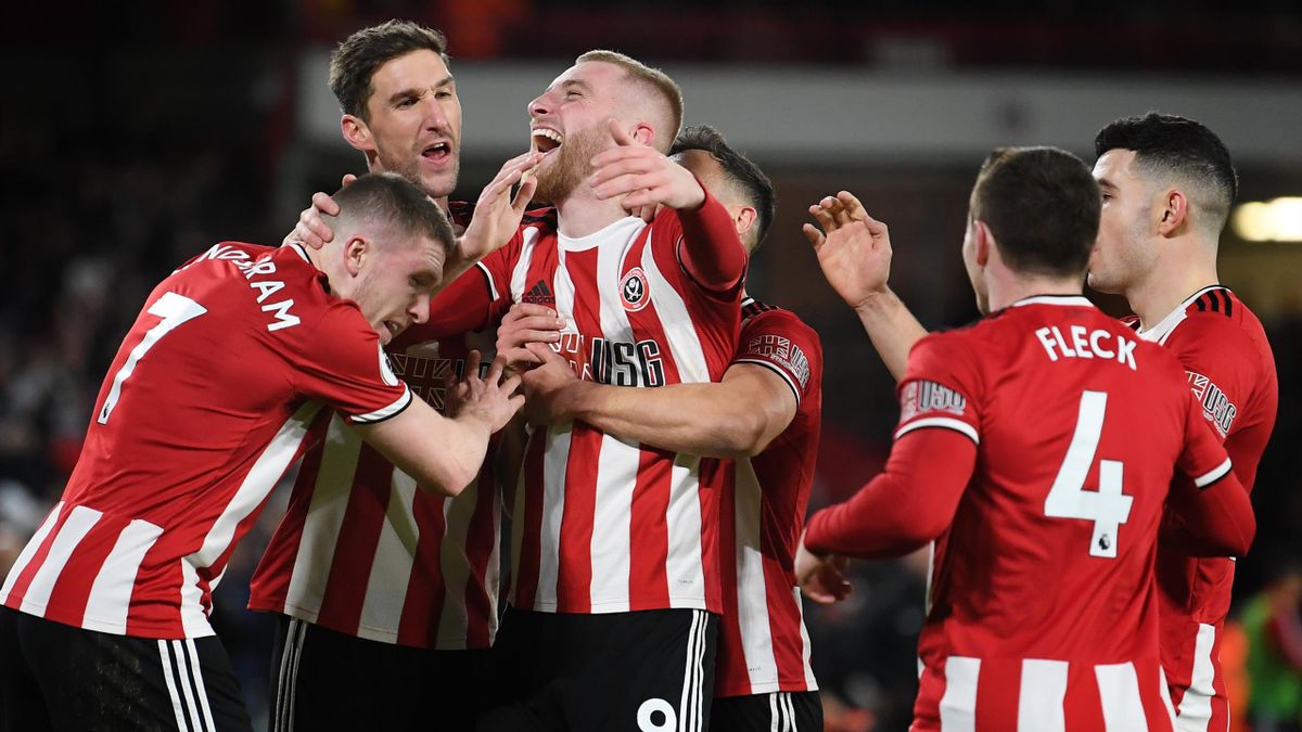 Oliver McBurnie of Sheffield United celebrates with his team after he scores his sides first goal during the Premier League match between Sheffield United and West Ham United at Bramall Lane on January 10, 2020