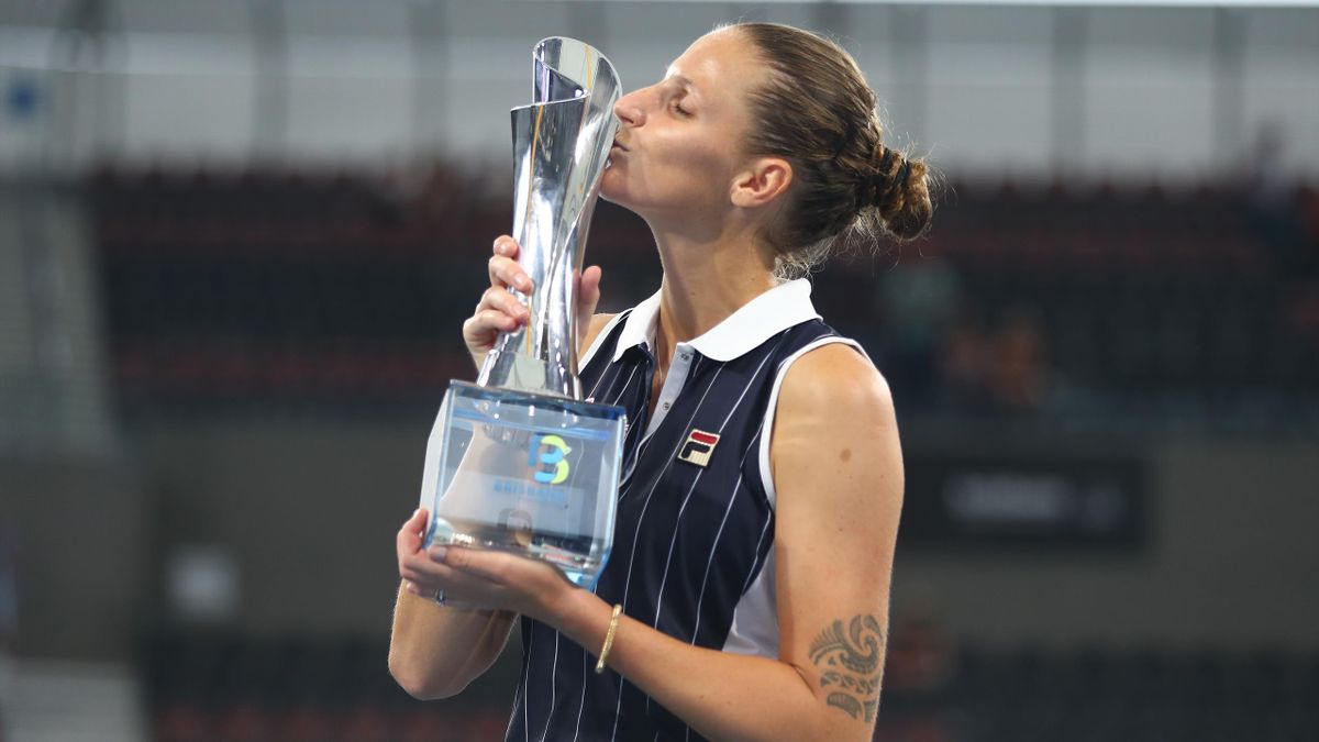 Karolina Pliskova of The Czech Republic kisses the winners trophy after the finals match against Madison Keys of the USA during day seven of the 2020 Brisbane International at Pat Rafter Arena on January 12, 2020 in Brisbane