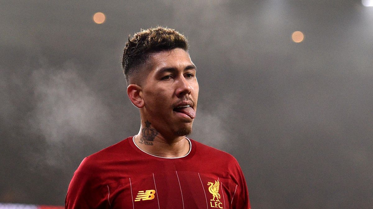 Liverpool's Brazilian midfielder Roberto Firmino reacts to a missed chance during the English Premier League football match between Wolverhampton Wanderers and Liverpool at the Molineux stadium in Wolverhampton, central England on January 23, 2020.