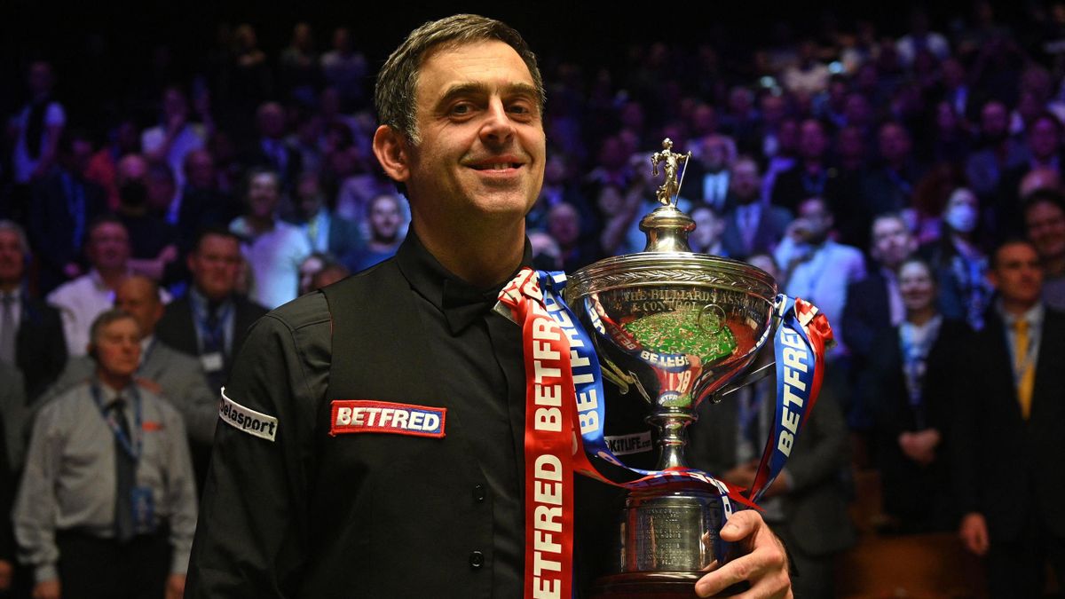 Ronnie O'Sullivan clasps the world title for a seventh time at the Crucible Theatre.