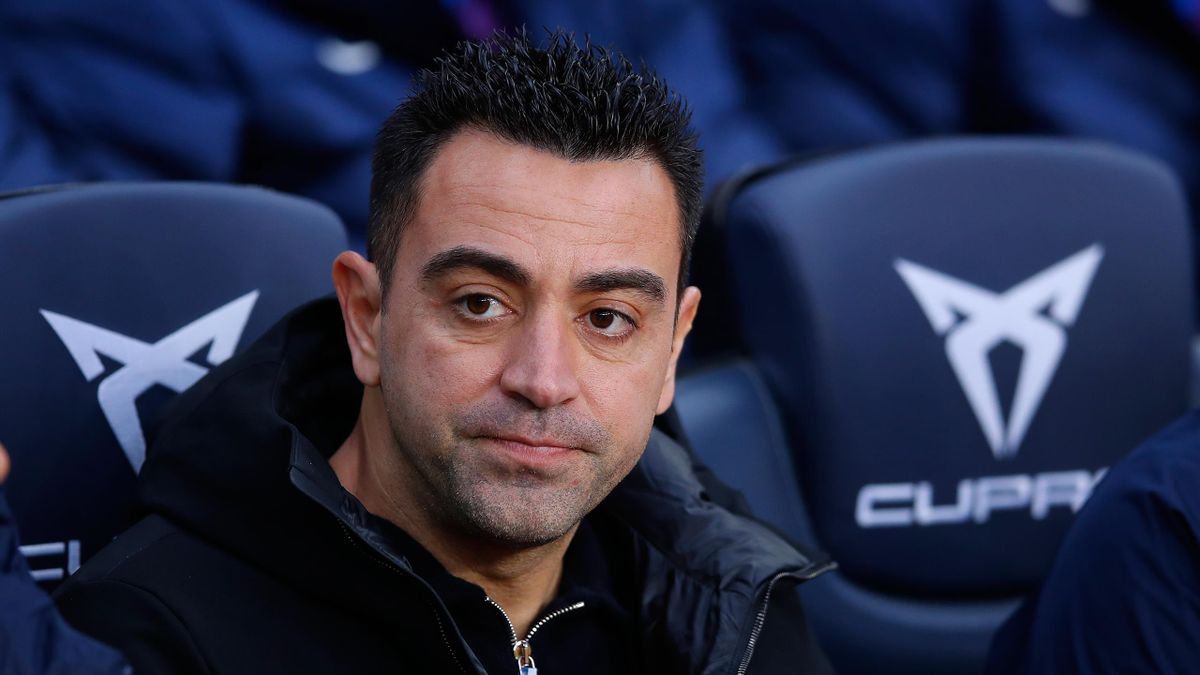 BARCELONA, SPAIN - DECEMBER 04: Xavi Hernandez, head coach of FC Barcelona looks on prior to the La Liga Santander match between FC Barcelona and Real Betis at Camp Nou on December 04, 2021 in Barcelona, Spain. (Photo by Eric Alonso/Getty Images)
