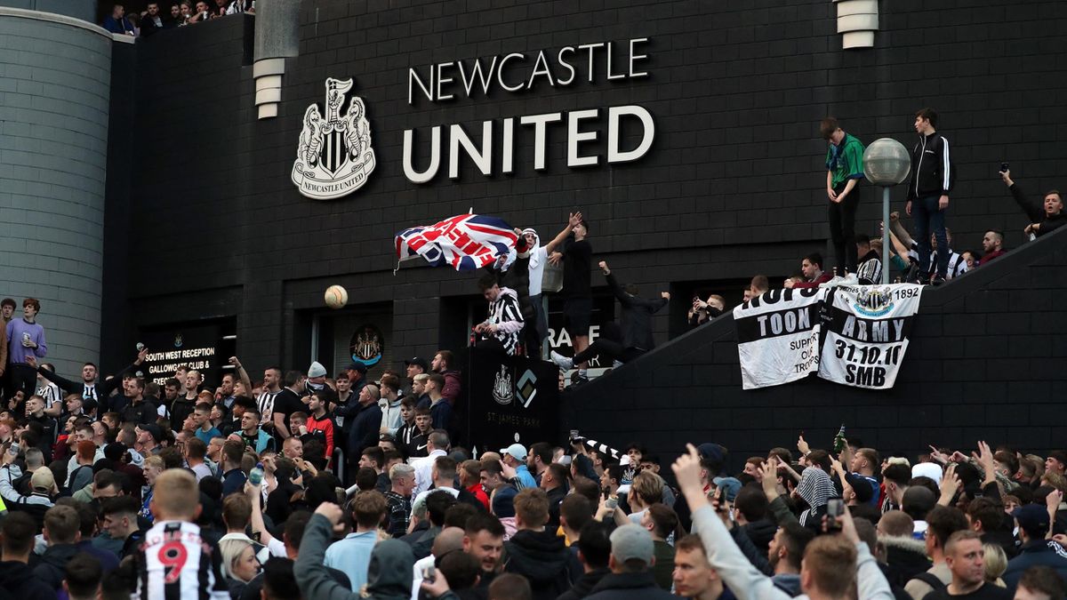 Newcastle fans celebrate the club's takeover